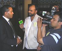 Tommy Miah being interviewed for Bangladeshi TV